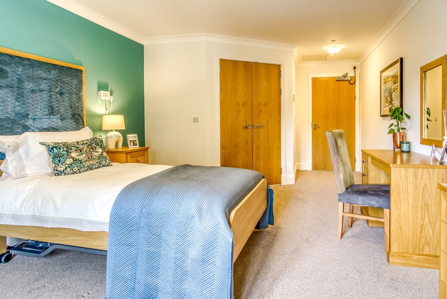 Care home bedroom at Richmond Village Witney