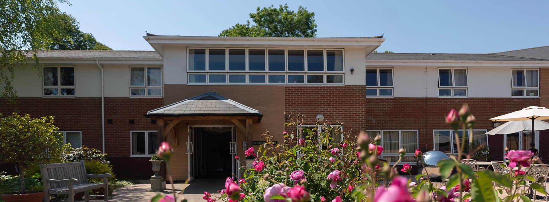 Exterior and garden at Rusthall Lodge Care Home