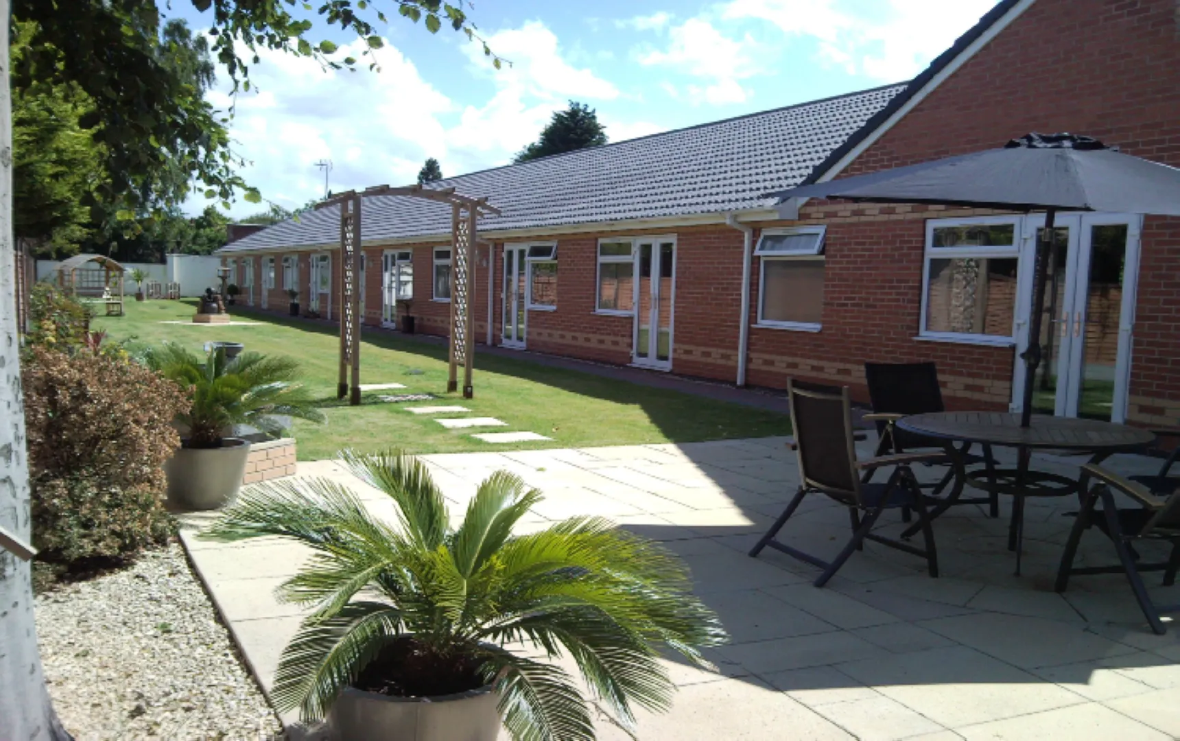 Garden and patio at Sandrock House Residential Care Home