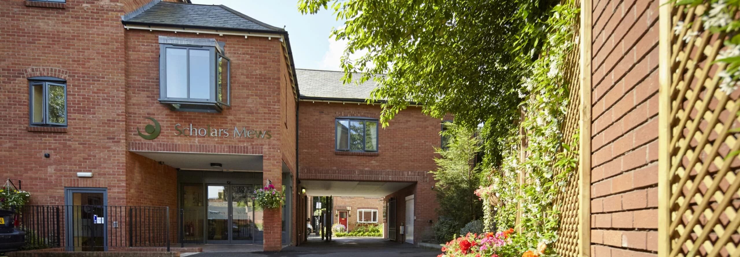 Exterior and entrance at Scholars Mews Care Home