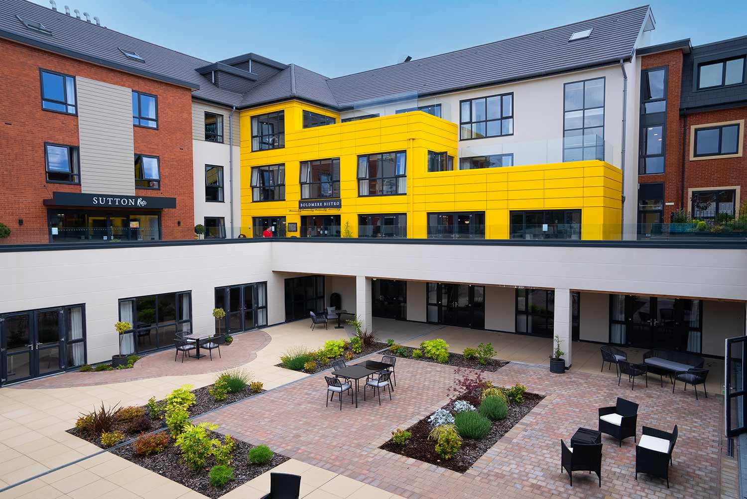 Exterior and courtyard at Sutton Rose Care Home
