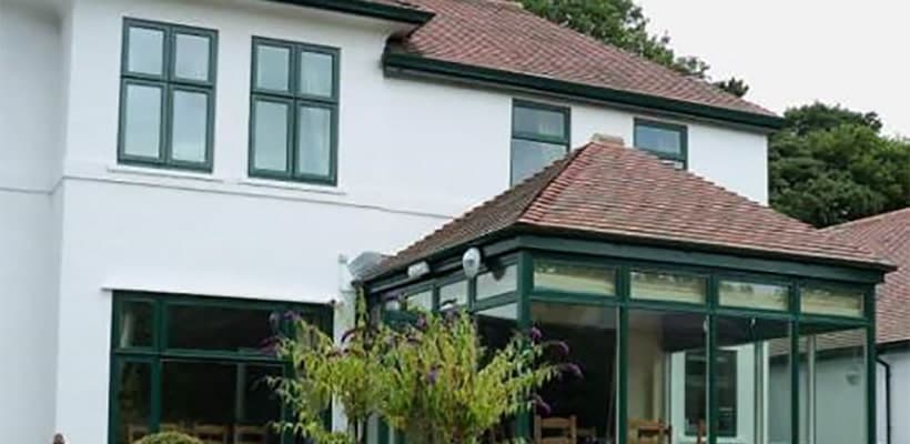 Exterior and conservatory at Tigh Bruadair