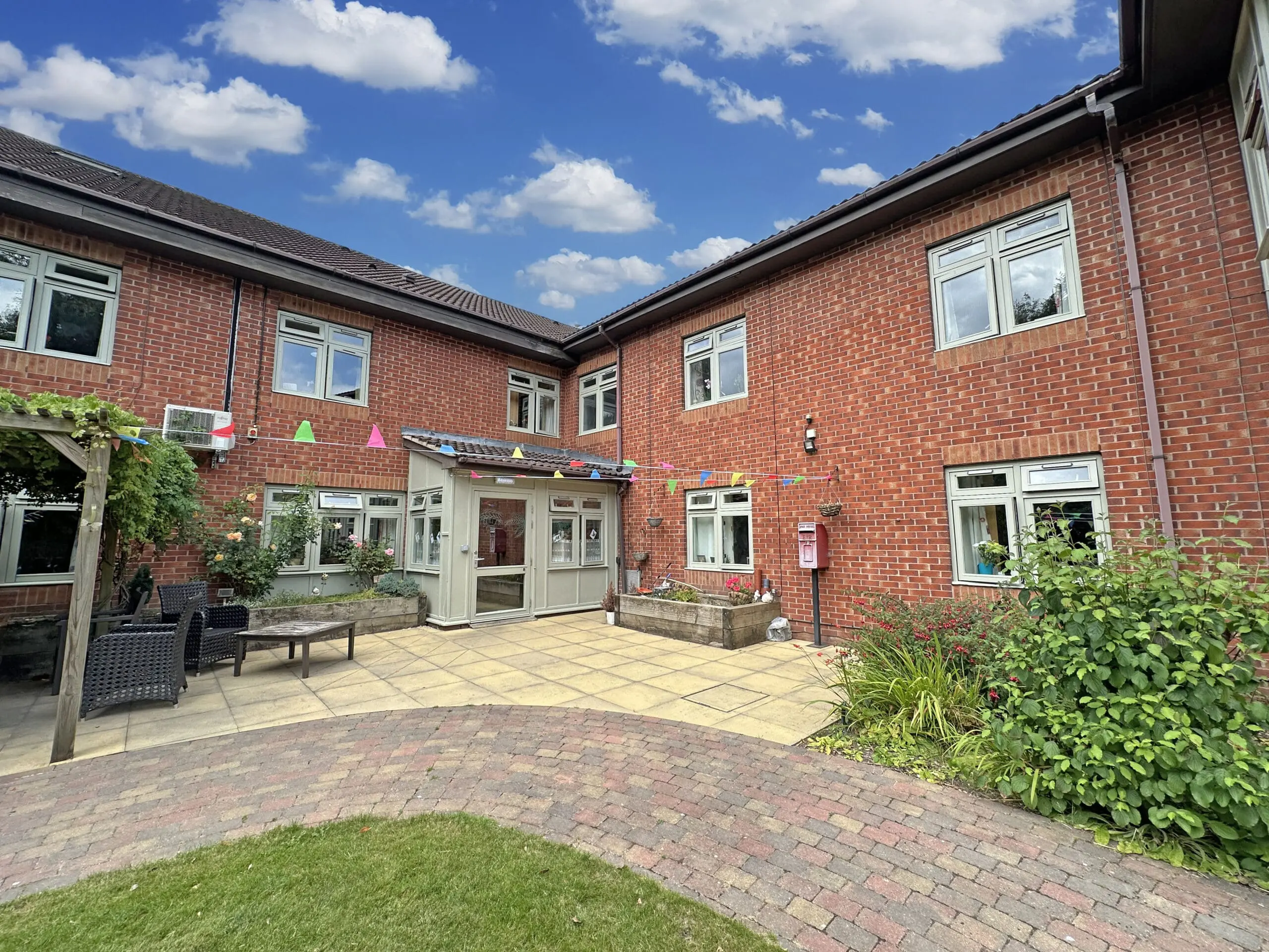 Exterior and patio at Waters Edge Care Home